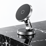 Magnetic phone mount on black marble surface, premium studio shot