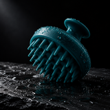 Silicone scalp massager shampoo brush dark editorial shot with water droplets on slate
