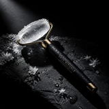 Ice Face Roller dark editorial product shot with dramatic lighting and frost crystals
